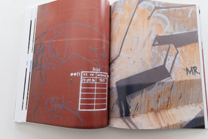 121/183 761 PHOTOS OF RED-BROWN STEEL FREIGHT WAGONS WITH A PAINTING ON THE SIDE