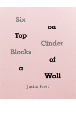 SIX CINDER BLOCKS ON TOP OF A WALL